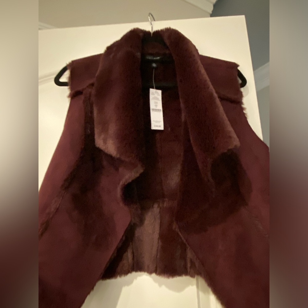 Whitehouse Blackmarket Fur Vest. New, with tags never worn. Size Small.